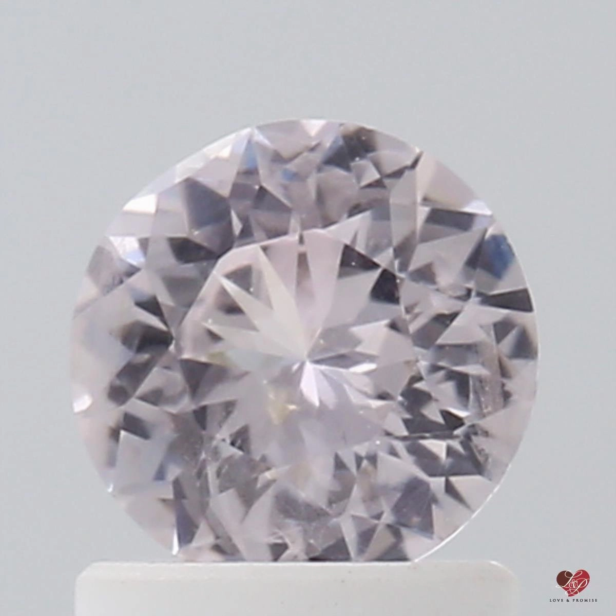 1.02cts Round Blush Champagne Sapphire