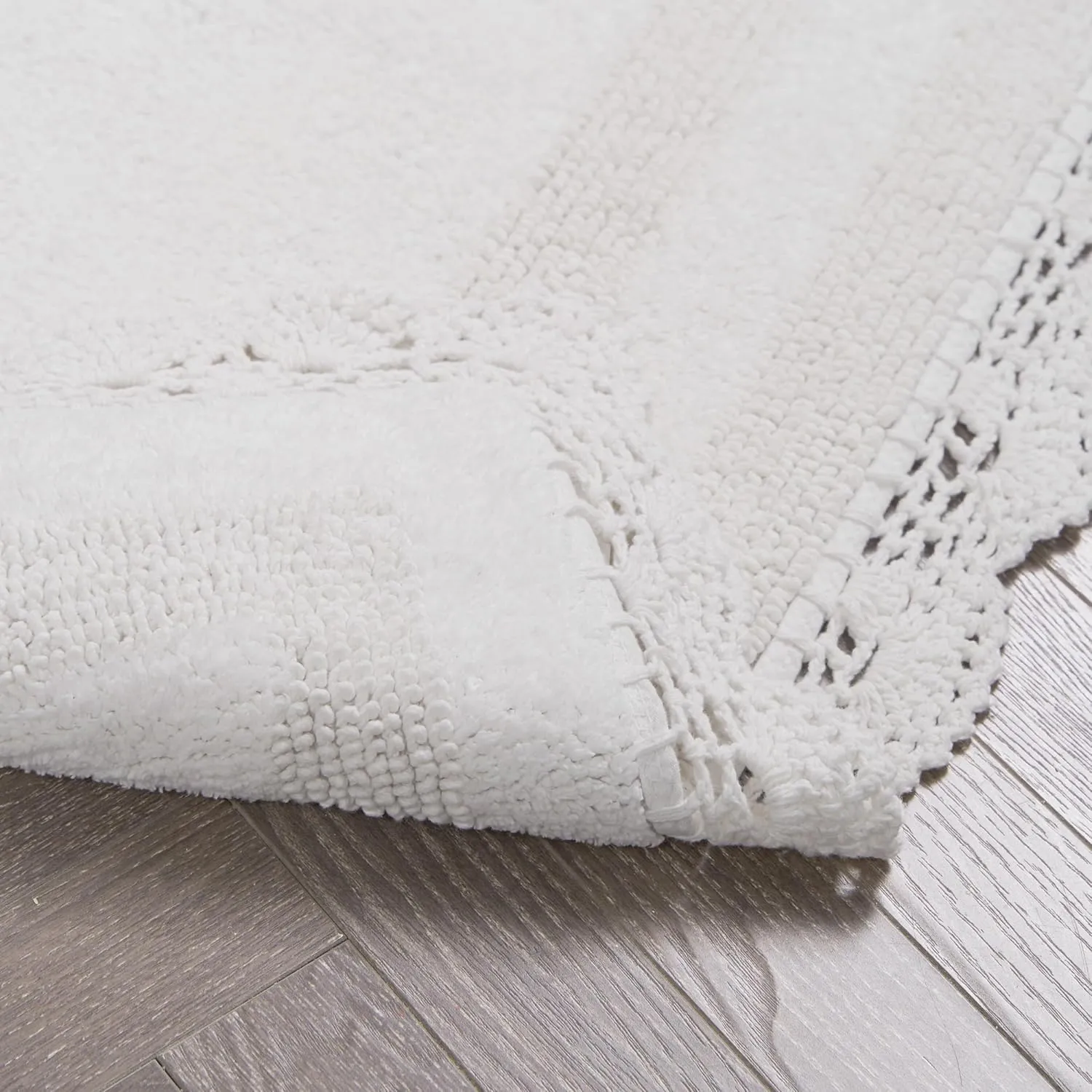 Laura Ashley Crochet Cotton 17x24/21x34 in. 2-Piece Bath Rug Set, Creamy White