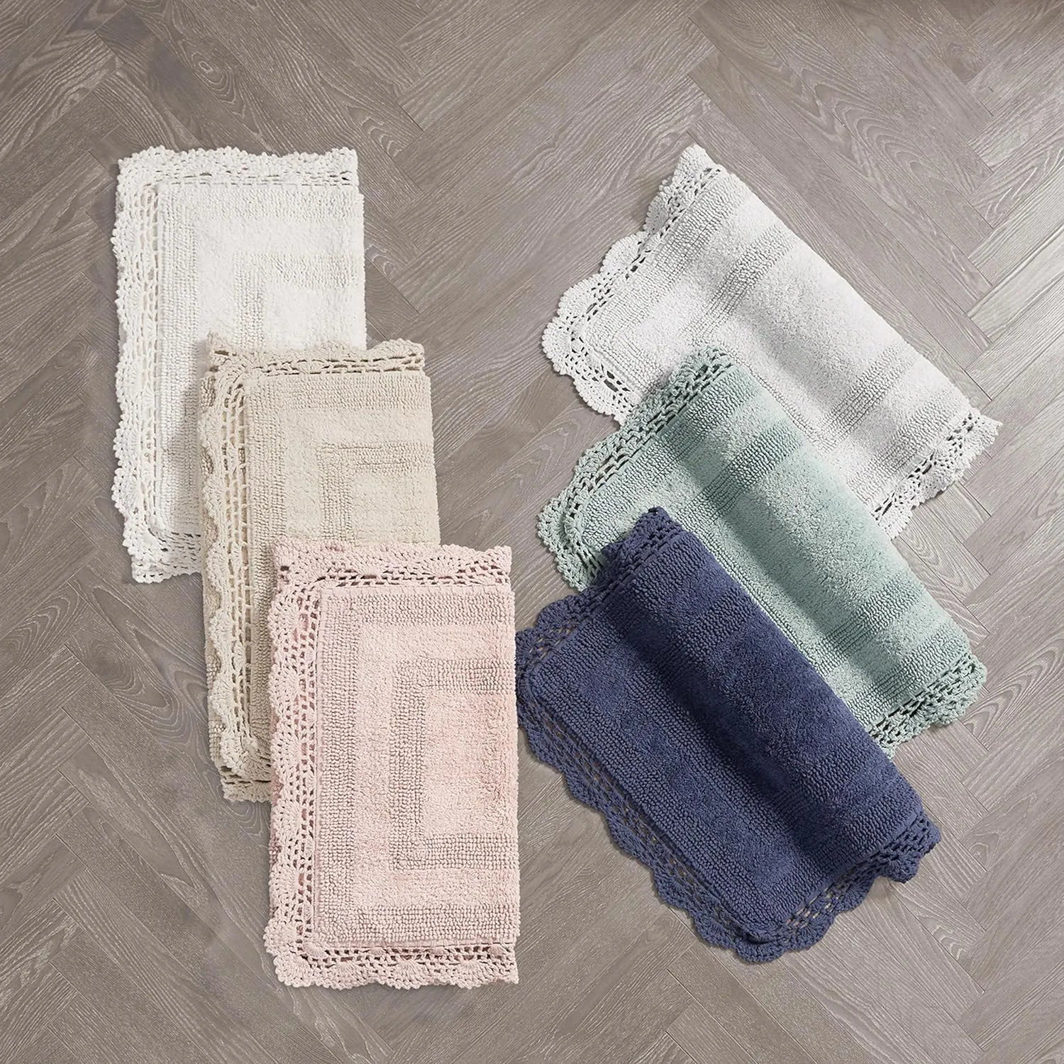 Laura Ashley Crochet Cotton 17x24/21x34 in. 2-Piece Bath Rug Set, Creamy White